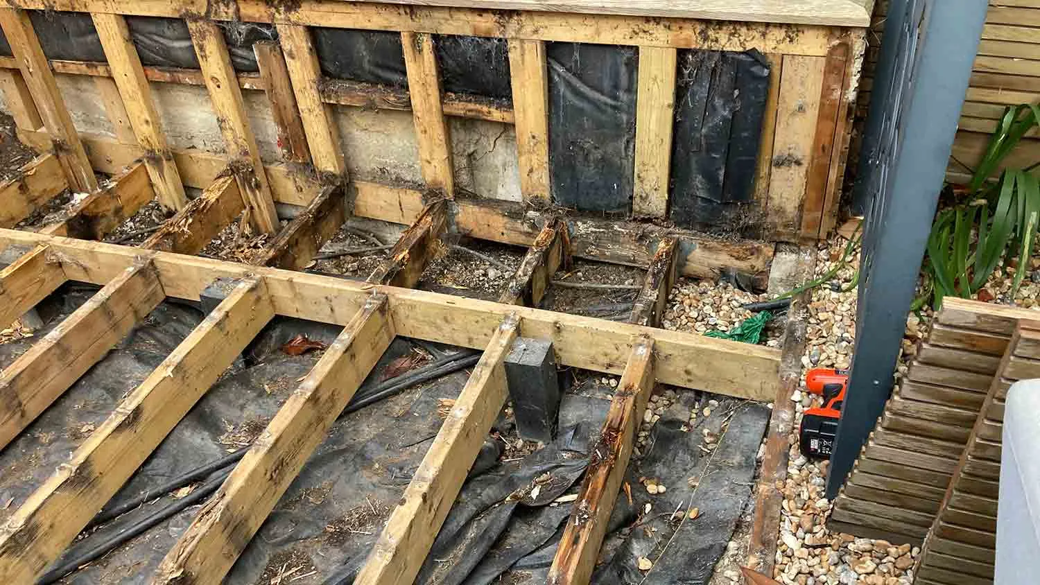 The existing decking was unsafe after years of rain damage to the sub structure
